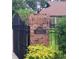Close up of brick gate post with decorative address sign at 3923 Hudson Ln, Tampa, FL 33618