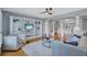 Cozy living room with built-in shelving, plush seating and an open floorplan at 3923 Hudson Ln, Tampa, FL 33618