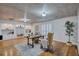 Office with hardwood floors, wainscoting, shutters, and built in bookshelves and storage at 3923 Hudson Ln, Tampa, FL 33618