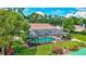 This screened pool enclosure offers a private tropical oasis at 3923 Hudson Ln, Tampa, FL 33618