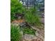 Charming water feature and pond adds a tranquil element to the outdoor space at 3923 Hudson Ln, Tampa, FL 33618
