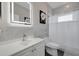Modern bathroom with updated fixtures and tiled shower at 4147 Grandchamp Cir, Palm Harbor, FL 34685