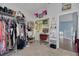 Bedroom with vanity and closet space at 4147 Grandchamp Cir, Palm Harbor, FL 34685