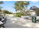 Clubhouse entrance featuring a place to park golf carts at 4147 Grandchamp Cir, Palm Harbor, FL 34685