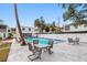 Community swimming pool with outdoor seating and shaded areas, creating a relaxing and enjoyable atmosphere at 4611 W North B St # 228, Tampa, FL 33609