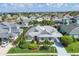 Aerial view showcasing home's landscaped yard, roof, and community at 4743 Spinnaker Dr, Bradenton, FL 34208