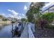 Private boat dock with a boat lift, providing convenient access for boating and water activities at 4743 Spinnaker Dr, Bradenton, FL 34208