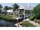 Home with boat dock and lift overlooking a canal at 4743 Spinnaker Dr, Bradenton, FL 34208