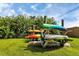 Kayak storage rack showcasing a variety of kayaks in a community recreation area at 4743 Spinnaker Dr, Bradenton, FL 34208