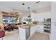 Well-equipped kitchen with stainless steel appliances, granite countertops, and a breakfast bar at 4743 Spinnaker Dr, Bradenton, FL 34208