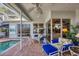 Relaxing covered lanai with furniture, offering a seamless indoor-outdoor living experience at 4743 Spinnaker Dr, Bradenton, FL 34208