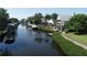 Home with waterfront access featuring a private dock and boat lift at 4743 Spinnaker Dr, Bradenton, FL 34208