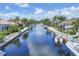 Picturesque canal view lined with well-maintained homes and private docks at 4743 Spinnaker Dr, Bradenton, FL 34208