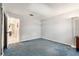 Spacious bedroom with blue carpet and neutral wall paint at 5623 80Th N St # 415, St Petersburg, FL 33709