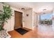 Hallway featuring elevator access, tile floors, and convenient access to upper floors at 5623 80Th N St # 415, St Petersburg, FL 33709