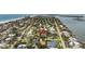 High-altitude aerial view of the property showing its location near the water and surrounding residential area at 58 Aster St, Clearwater Beach, FL 33767