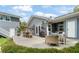 Spacious backyard deck with outdoor seating and a dining area perfect for entertaining at 58 Aster St, Clearwater Beach, FL 33767