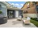 Comfortable outdoor seating on a deck with a grill, ideal for relaxed gatherings at 58 Aster St, Clearwater Beach, FL 33767