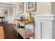 Stylish bar area with rattan accents, decorative glassware, and elegant decor at 58 Aster St, Clearwater Beach, FL 33767