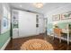 Multi-purpose room with Murphy bed, desk and shelving at 58 Aster St, Clearwater Beach, FL 33767