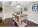Charming dining area featuring a rustic console table, decorative lighting, and stylish accents at 58 Aster St, Clearwater Beach, FL 33767
