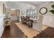 Inviting dining room with wood table, stylish seating, and decorative accents at 58 Aster St, Clearwater Beach, FL 33767