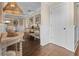 Inviting hallway showcases wood floors, decorative lighting, and stylish furnishings at 58 Aster St, Clearwater Beach, FL 33767