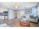 Cozy living room featuring a kitchenette, a comfortable sofa, and a stylish coffee table at 58 Aster St, Clearwater Beach, FL 33767