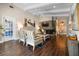 Relaxing living area with stone fireplace, comfortable seating, and elegant decor at 58 Aster St, Clearwater Beach, FL 33767