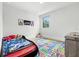 bedroom with car-themed decor, and bright area rug at 5816 S 3Rd St, Tampa, FL 33611