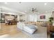 Open-concept living space featuring a dining area that blends into a comfortable living area at 5816 S 3Rd St, Tampa, FL 33611