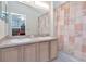 Bathroom featuring a double sink vanity, a shower/tub with a decorative curtain at 6231 Olivedale Dr, Riverview, FL 33578