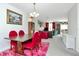 Open living space featuring dining area, plush seating, and a decorative rug at 6231 Olivedale Dr, Riverview, FL 33578