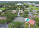 Aerial shot of a residential community including tennis courts and community pool at 6262 142Nd N Ave # 1302, Clearwater, FL 33760