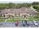 Aerial view of well-kept condo complex with tidy landscaping and ample parking at 6262 142Nd N Ave # 1302, Clearwater, FL 33760