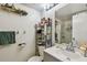 Functional bathroom with a vanity, toilet, and shower, offering essential amenities at 6262 142Nd N Ave # 1302, Clearwater, FL 33760