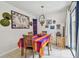 The dining room features tile floors and a sliding glass door at 6262 142Nd N Ave # 1302, Clearwater, FL 33760