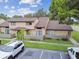 Beautiful condo exterior with designated parking and well maintained landscaping at 6262 142Nd N Ave # 1302, Clearwater, FL 33760