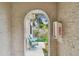 Cozy exterior patio with seating and a view of the surrounding greenery at 6262 142Nd N Ave # 1302, Clearwater, FL 33760