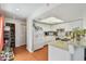 Well-maintained kitchen with white cabinetry, bright lighting, and a practical layout at 6262 142Nd N Ave # 1302, Clearwater, FL 33760