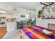 Open floorplan joining the dining area, living room, and kitchen at 6262 142Nd N Ave # 1302, Clearwater, FL 33760