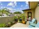 Charming patio with cozy seating, potted plants, offering a relaxing outdoor space at 6262 142Nd N Ave # 1302, Clearwater, FL 33760