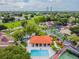 A community pool with tennis court and landscaping at 6262 142Nd N Ave # 1302, Clearwater, FL 33760