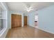 Bright bedroom with a spacious closet and laminate flooring at 6706 Dunes Ln, Temple Terrace, FL 33617