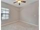 This bedroom features a cozy feel, natural light, ceiling fan, and unique storage solution at 7408 Sungold Meadow Ct, Apollo Beach, FL 33572