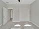 This bedroom is light and airy with plush carpets and a large double door closet offering plenty of storage space at 7408 Sungold Meadow Ct, Apollo Beach, FL 33572