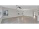 Bright living room features light wood floors, recessed lights, and modern design at 7408 Sungold Meadow Ct, Apollo Beach, FL 33572