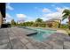 The inviting pool area boasts a built-in spa and patio, perfect for relaxing at 7408 Sungold Meadow Ct, Apollo Beach, FL 33572