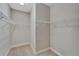 Walk-in closet with carpet flooring and wire shelving at 7408 Sungold Meadow Ct, Apollo Beach, FL 33572