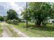 View of side yard access and fenced backyard, offering outdoor space at 760 72Nd N Ave, St Petersburg, FL 33702